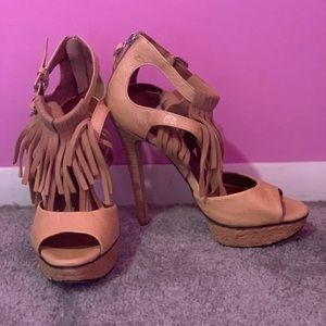 Tan fringe heeled sandals with a peep toe